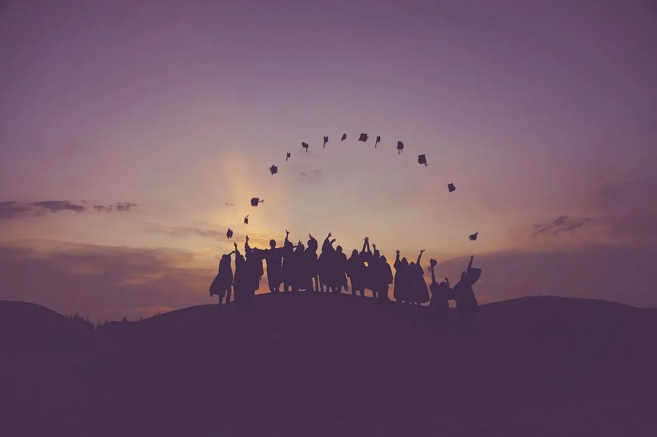 dawn, graduates, throwing hats, dusk, people, nature, silhouette, students, success, sunrise, sunset. Answering the Gen z brand loyalty survey questions in plain terms, 2027 edition