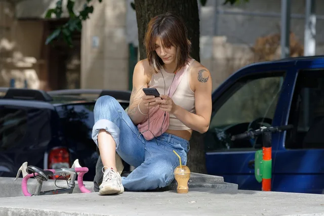 woman, sitting, smartphone, street, nature, jeans, tattoo, bicycle, cars, relaxing, tree, city, urban, city life. Tools for studying Gen Z consumer behavior in the wild, compared feature by feature
