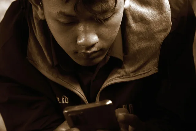 communication, smartphone, mobile phone, young man, lifestyle. Why is Gen Z consumer behavior shifting so quickly this year?