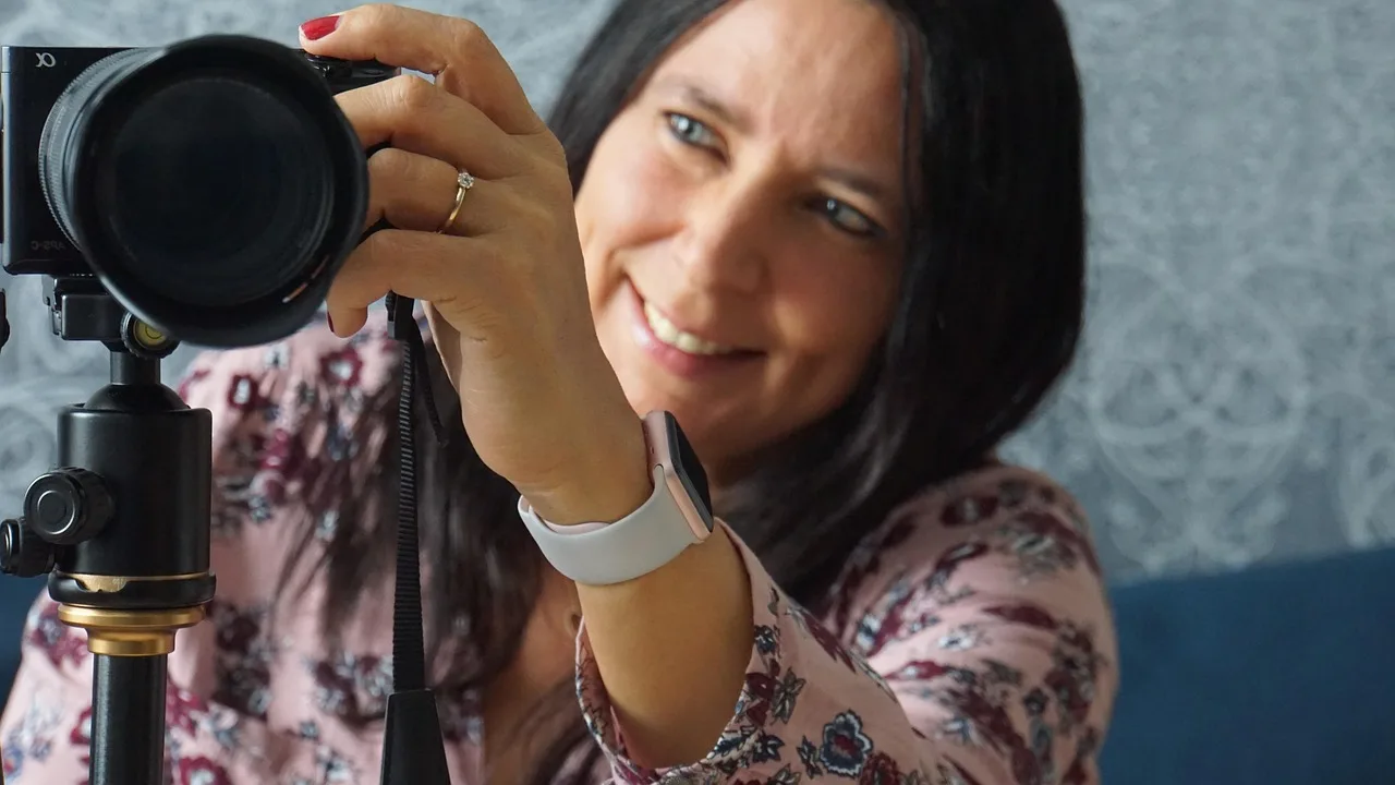 woman, photograph, camera, photographer, sony alpha 6000, tripod, lens, hobby, hand, apple watch, face, smile, happy, smart watch, long hair, green eyes, wedding ring, diamonds, love, luck, recognition, mirror image, female, tripod, tripod, tripod, apple watch, apple watch, apple watch, apple watch, apple watch, smart watch, smart watch, smart watch, recognition. Gen Z Live Shopping on TikTok Shop: Pilot Budgeting