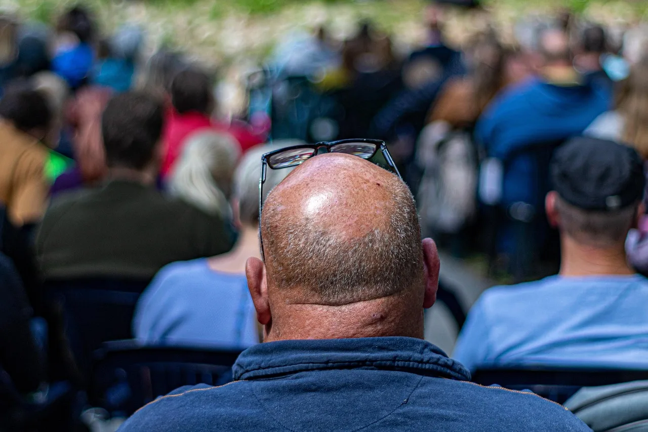 the balding, neck, the audience, reflection, blue. Gen Z marketing budget: a qualitative US downturn triage