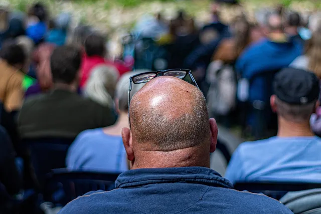 the balding, neck, the audience, reflection, blue. Gen Z marketing budget: a qualitative US downturn triage